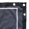 Close up of grommets and header of banner