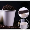 Paper cup with clear plastic lid